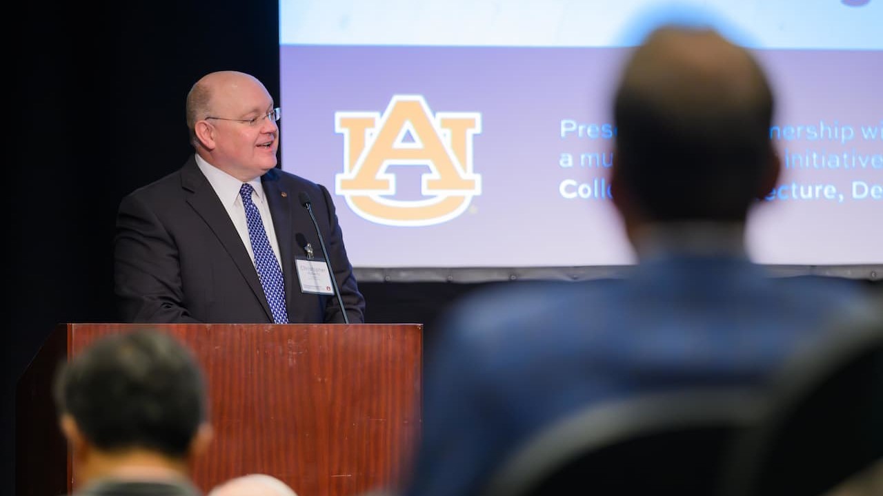 President Roberts speaking at a podium